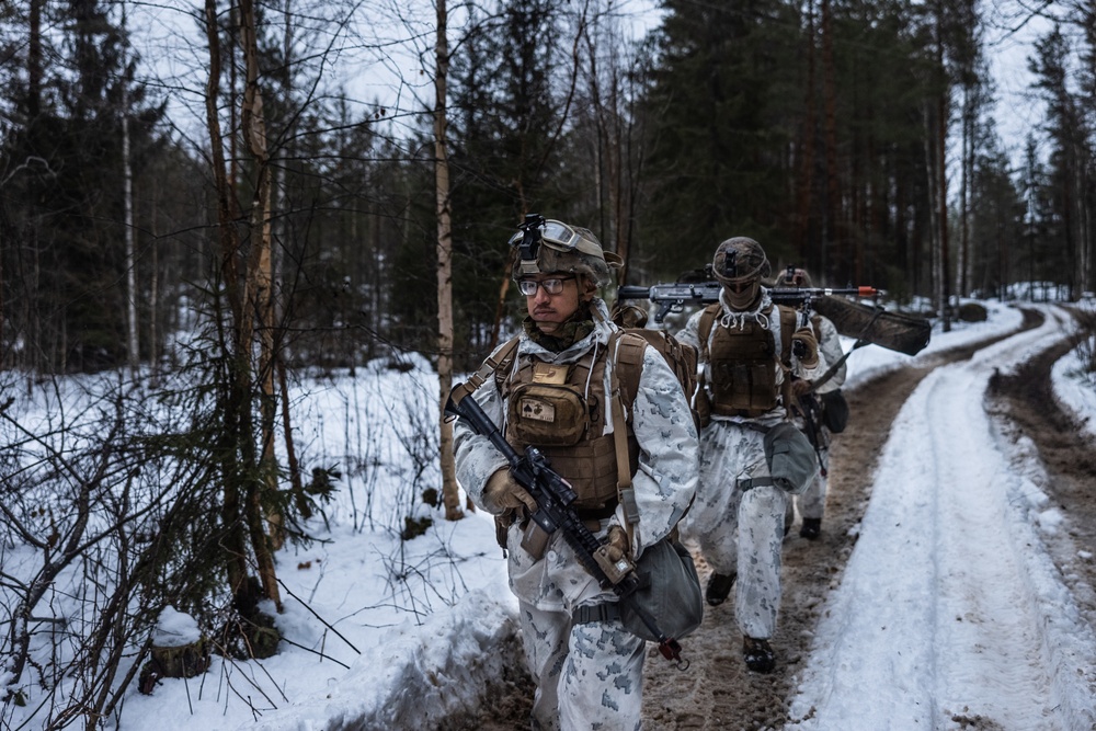 U.S. Marines Post Security for Finnish Soldiers