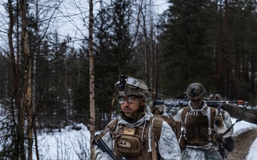 U.S. Marines Post Security for Finnish Soldiers