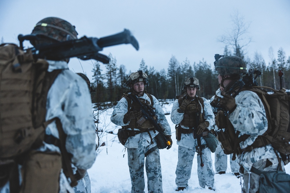 U.S. Marines Post Security for Finnish Soldiers