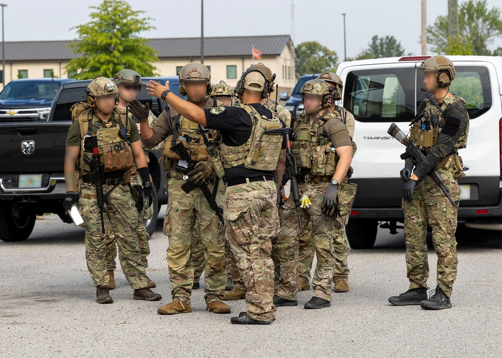 U.S. Army Soldiers from 5th SFG(A), 7th SFG(A), and 101st ABN DIV(ASSLT) Joint CBRN Training