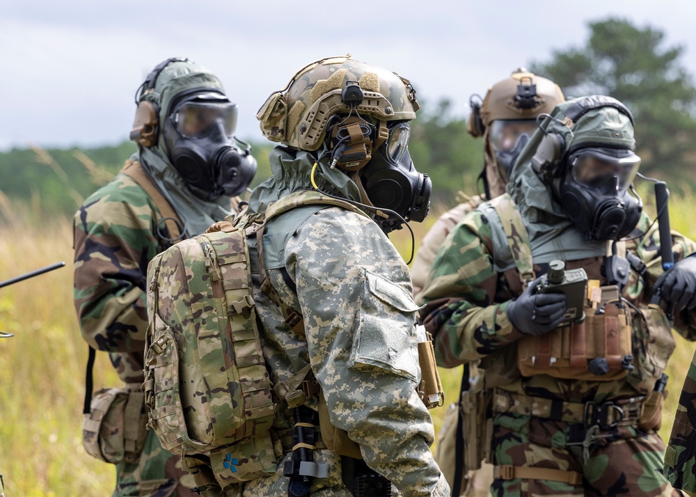 U.S. Army Soldiers from 5th SFG(A), 7th SFG(A), and 101st ABN DIV(ASSLT) Joint CBRN Training