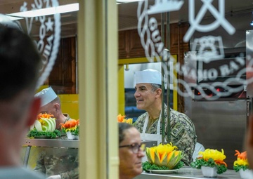 Rear Admiral Sardiello Serves Thanksgiving Day Meal At Naval Station Guantanamo Bay