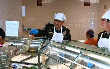 Leaders and DFAC staff thank the troops during Thanksgiving