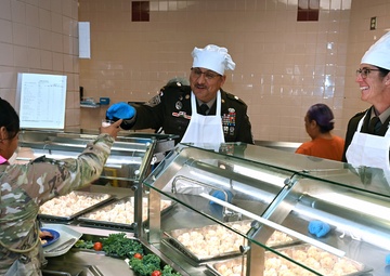 Leaders and DFAC staff thank the troops during Thanksgiving