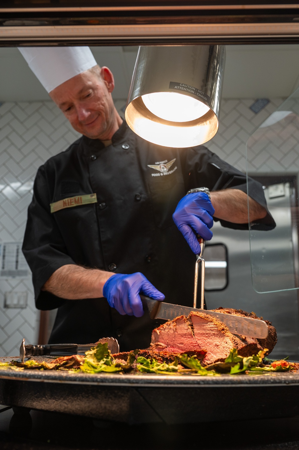 Nellis AFB leadership serve Thanksgiving meals at Crosswinds Dining Facility