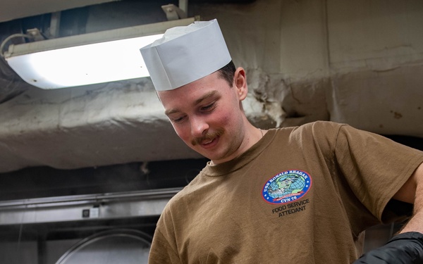 USS Ronald Reagan (CVN 76) hosts a Thanksgiving feast