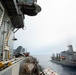 Abraham Lincoln conducts a replenishment-at-sea with USNS Rappahannock