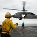 Abraham Lincoln conducts a replenishment-at-sea with USNS Rappahannock