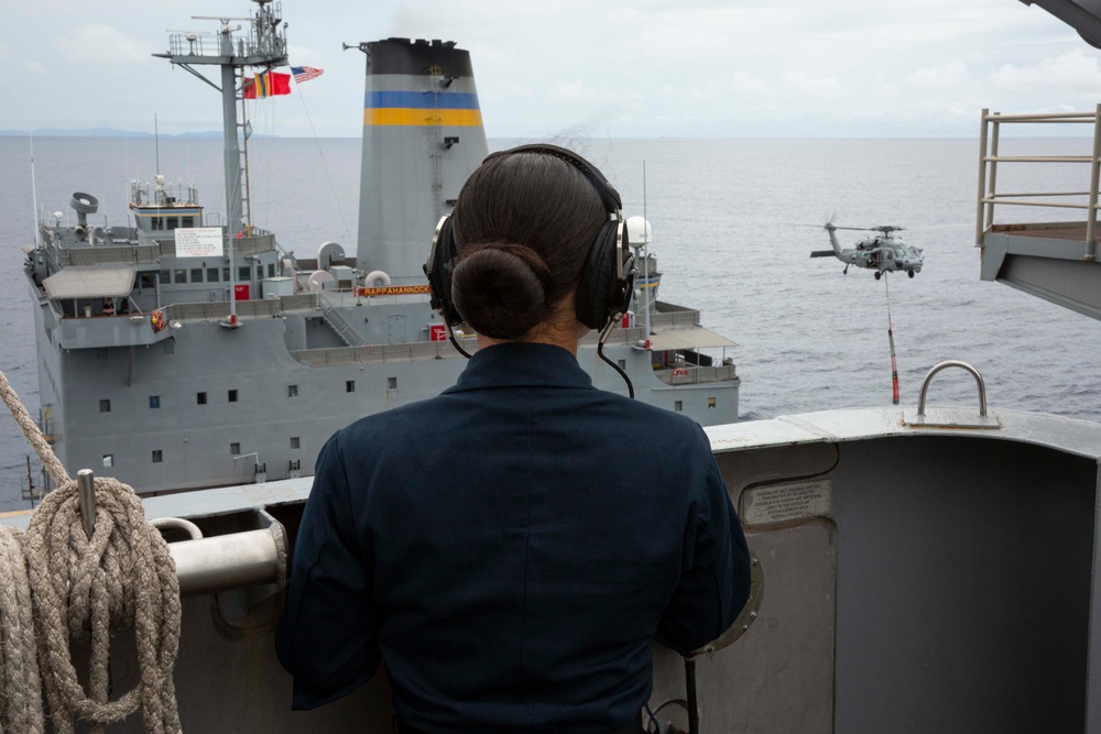 Abraham Lincoln conducts a replenishment-at-sea with USNS Rappahannock