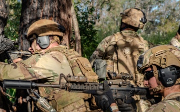 3-25 AVN Soldiers provide 2-27 Wolfhounds with cover-fire, transport