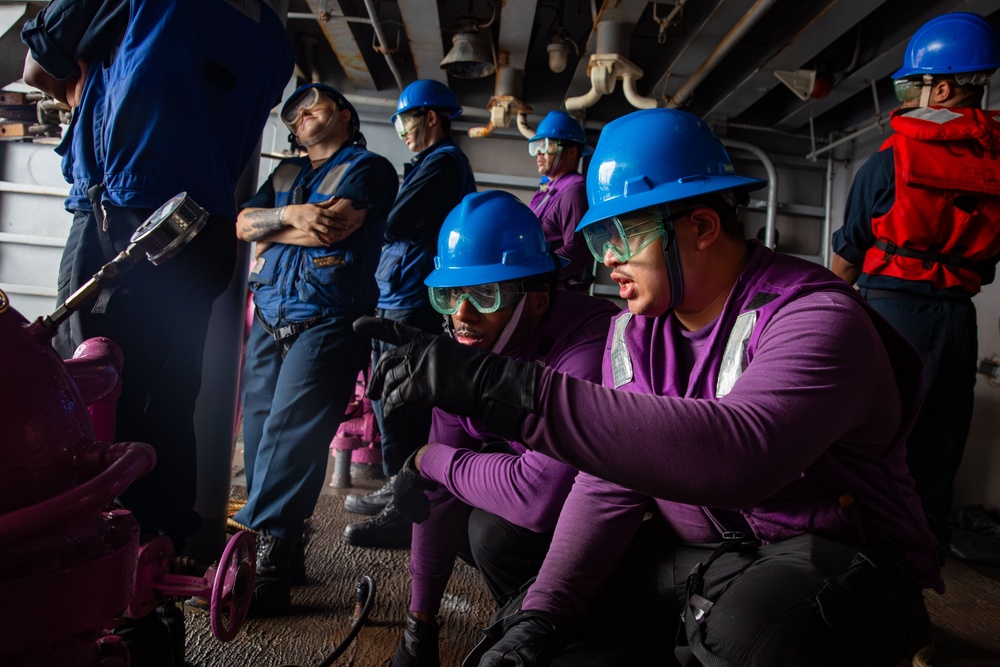 Abraham Lincoln conducts a replenishment-at-sea with USNS Rappahannock