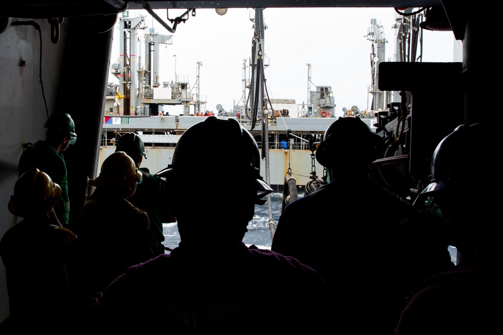 Abraham Lincoln conducts a replenishment-at-sea with USNS Rappahannock