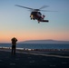 Sailors and Coast Guardsman medically evacuate a Sailor