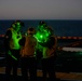 Sailors and Coast Guardsman medically evacuate a Sailor