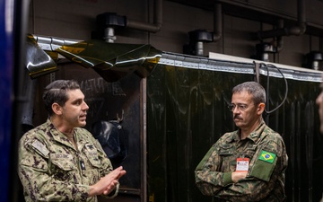 Brazilian marines tour the Naval Small Craft Instruction and Technical Training School during the Operational Naval Infantry Committee