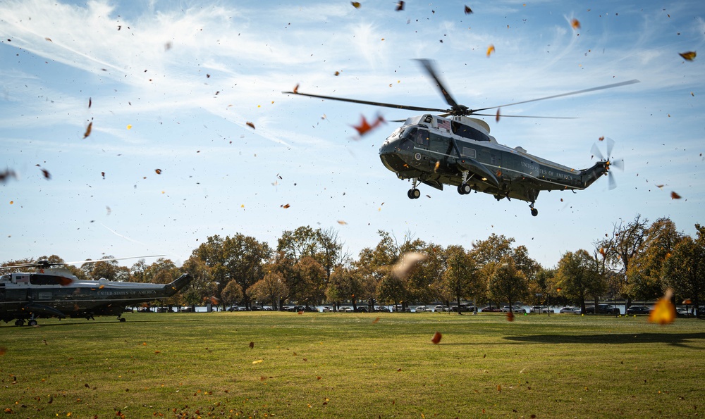 President Joe Biden lands at Fort McNair