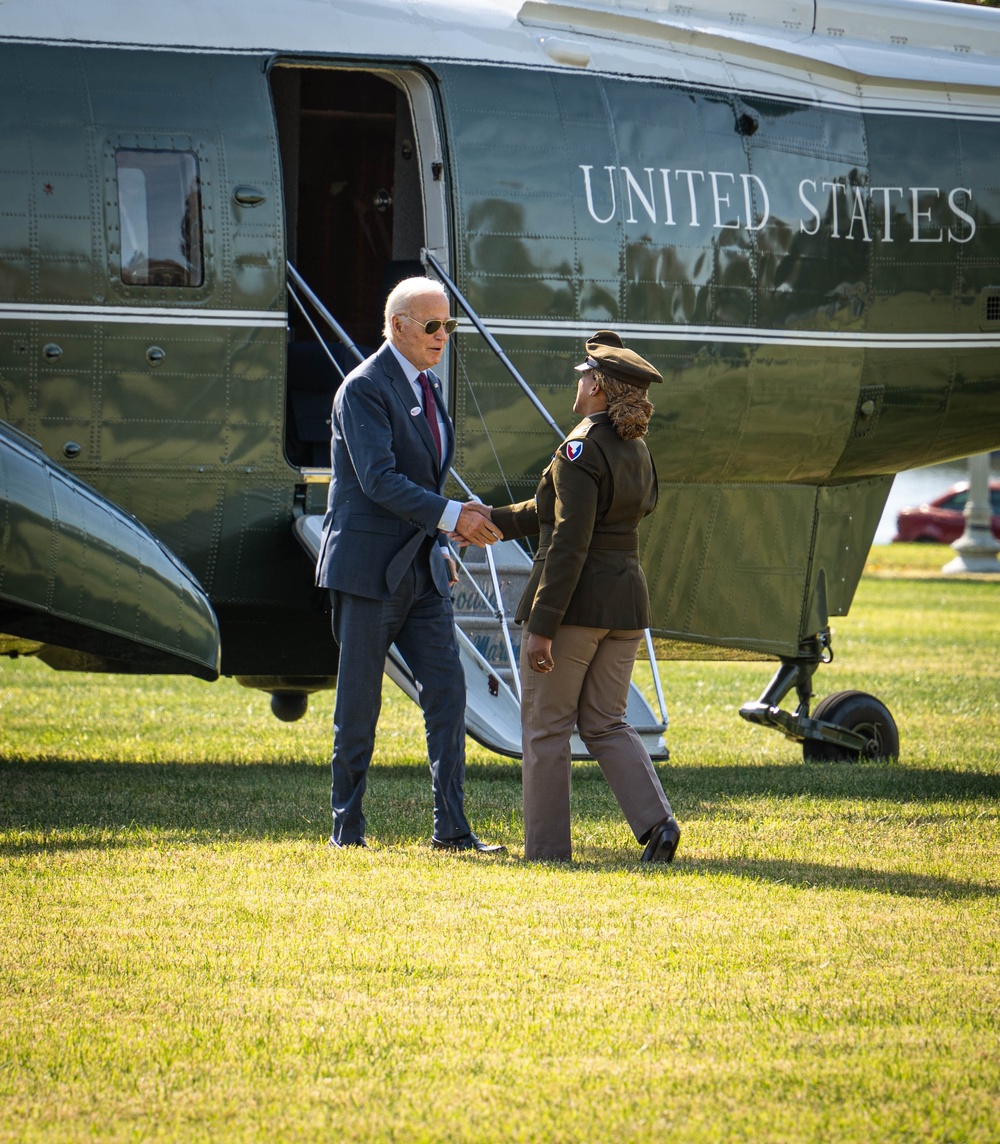 President Joe Biden lands at Fort McNair