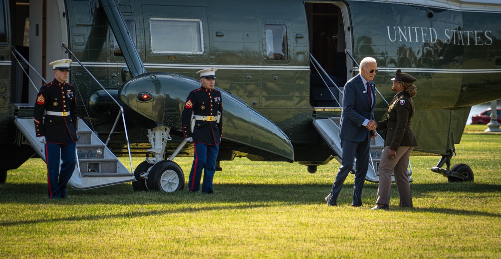 President Joe Biden lands at Fort McNair