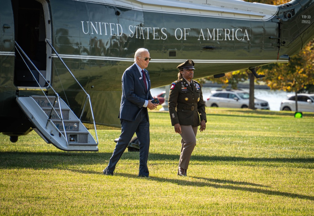 President Joe Biden lands at Fort McNair