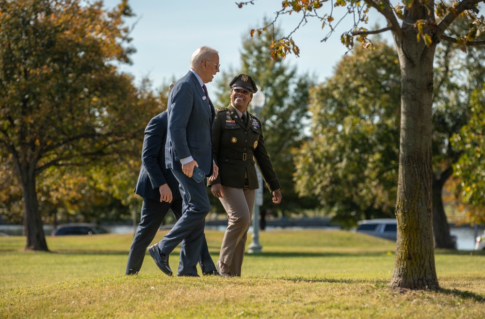 President Joe Biden lands at Fort McNair