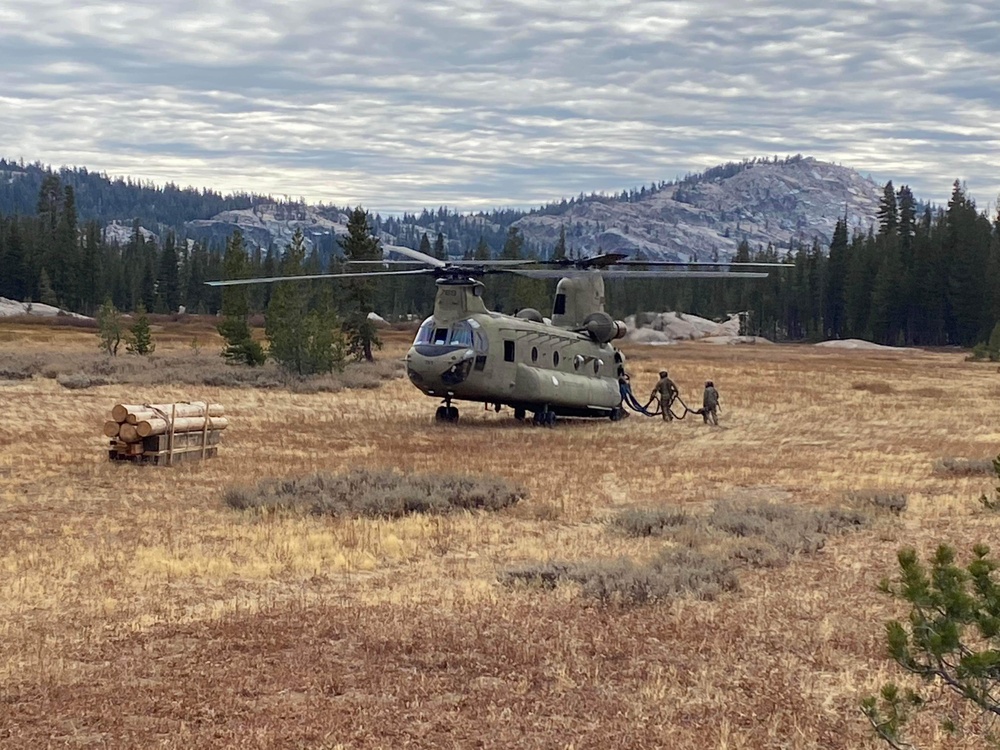 The California Army National Guard and the Stanislaus National Forest collaborate to deliver critical supplies in wilderness.