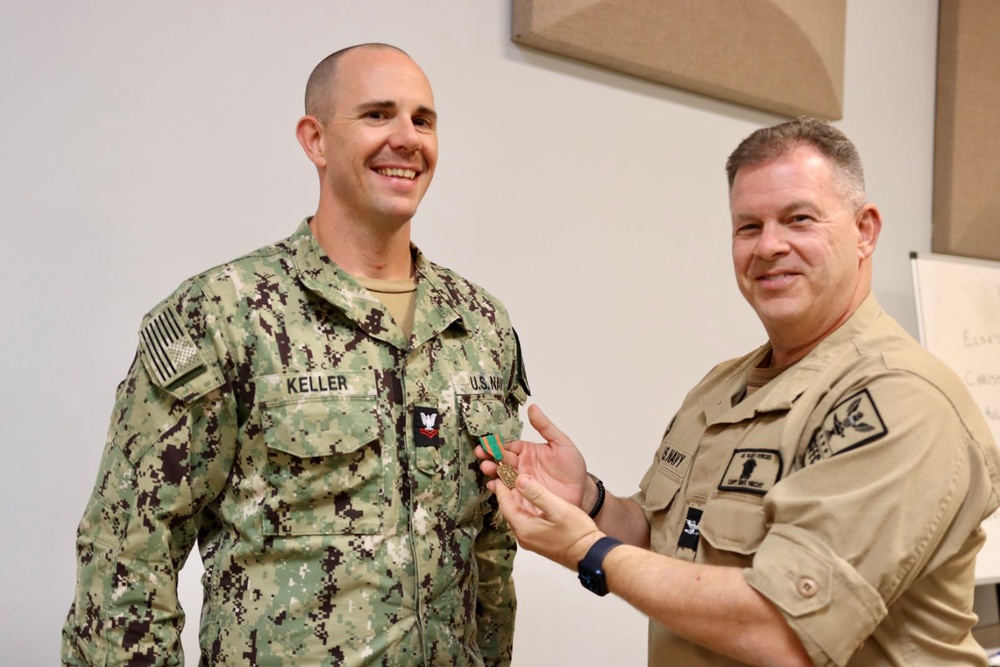 MU2 Keller Receives Medal