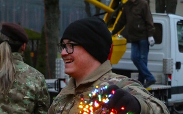 Forward Stationed Soldiers in Bemowo Piskie, Poland, decorate the base Christmas tree in celebration of the Holidays December 2, 2024