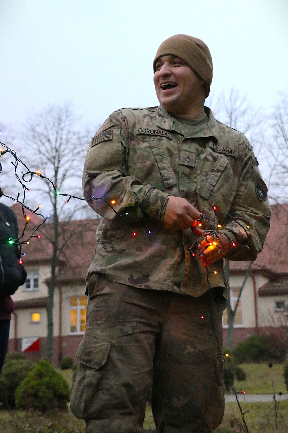 Forward Stationed Soldiers in Bemowo Piskie, Poland, decorate the base Christmas tree in celebration of the Holidays December 2, 2024