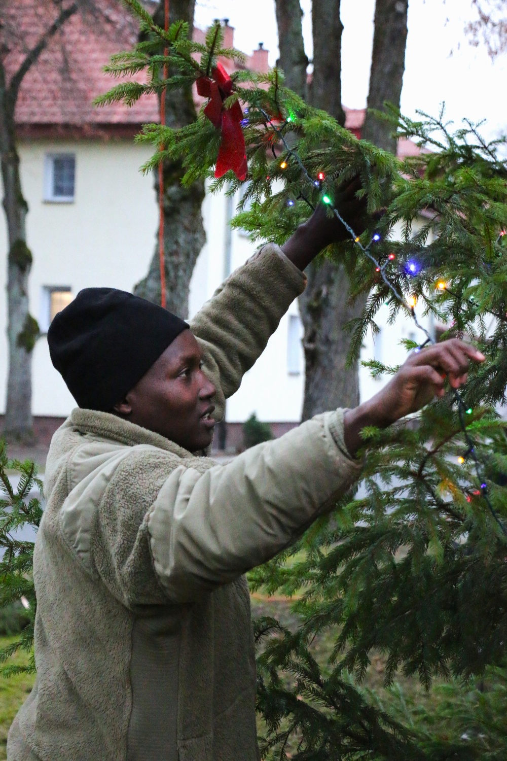 Forward Stationed Soldiers in Bemowo Piskie, Poland, decorate the base Christmas tree in celebration of the Holidays December 2, 2024