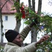 Forward Stationed Soldiers in Bemowo Piskie, Poland, decorate the base Christmas tree in celebration of the Holidays December 2, 2024