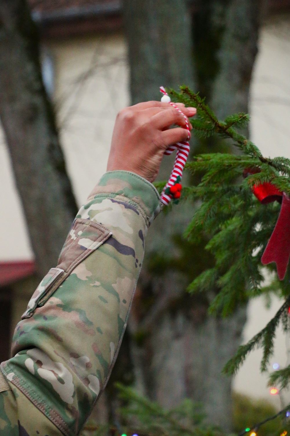 Forward Stationed Soldiers in Bemowo Piskie, Poland, decorate the base Christmas tree in celebration of the Holidays December 2, 2024