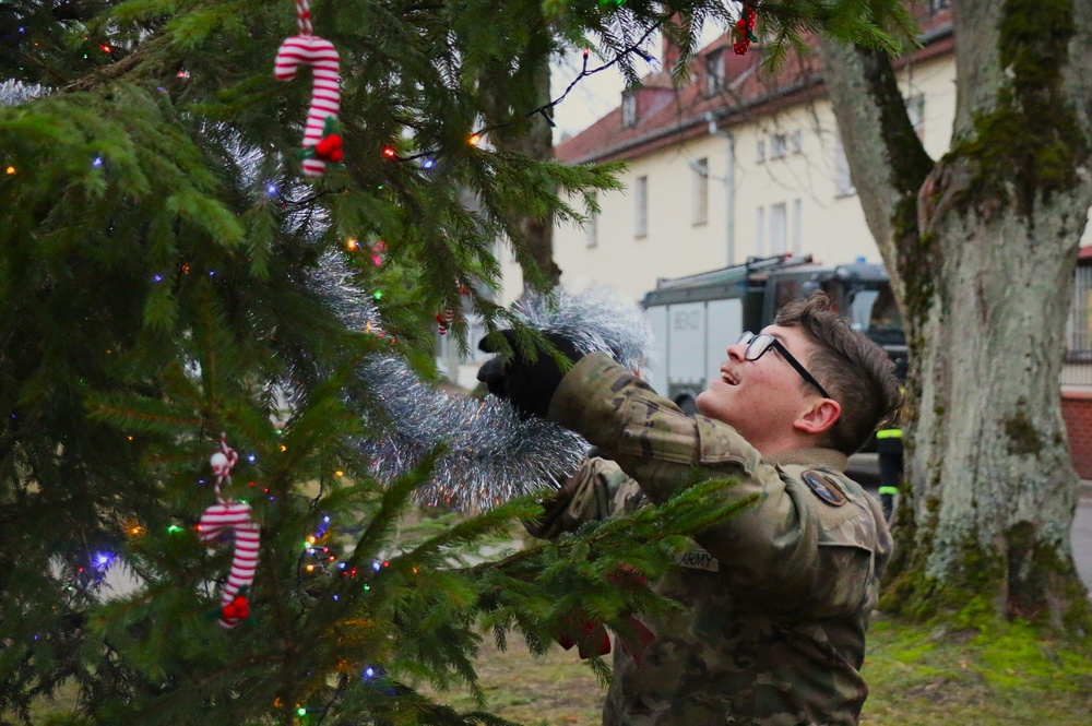 Forward Stationed Soldiers in Bemowo Piskie, Poland, decorate the base Christmas tree in celebration of the Holidays December 2, 2024