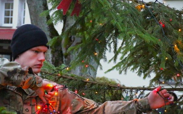 Forward Stationed Soldiers in Bemowo Piskie, Poland, decorate the base Christmas tree in celebration of the Holidays December 2, 2024
