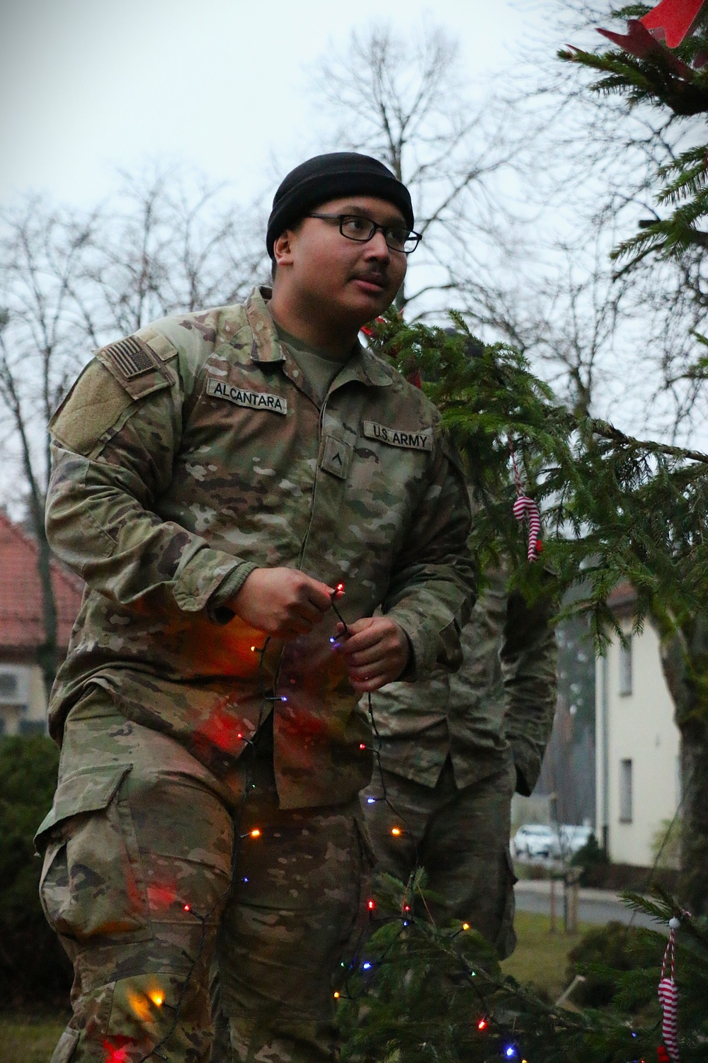 Forward Stationed Soldiers in Bemowo Piskie, Poland, decorate the base Christmas tree in celebration of the Holidays December 2, 2024