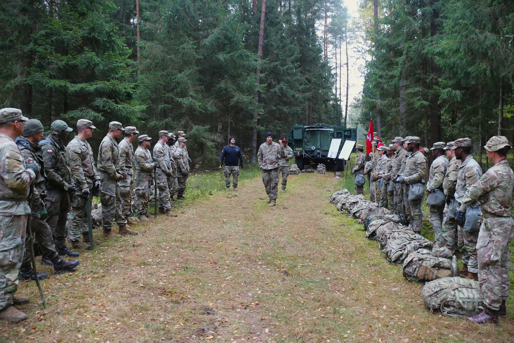 Forward Stationed Soldiers in Bemowo Piskie, Poland, demonstrate Excellence in traditional Spur Ride