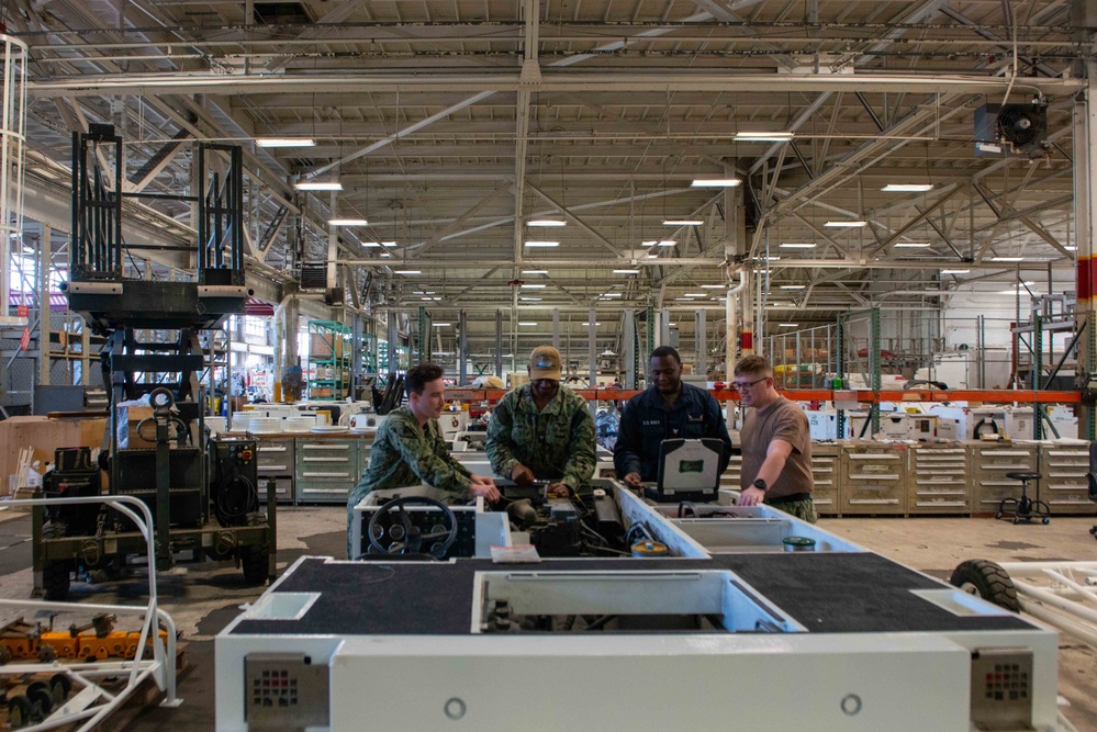 USS John C. Stennis (CVN 74) Sailors conduct maintenance at SERF Warehouse