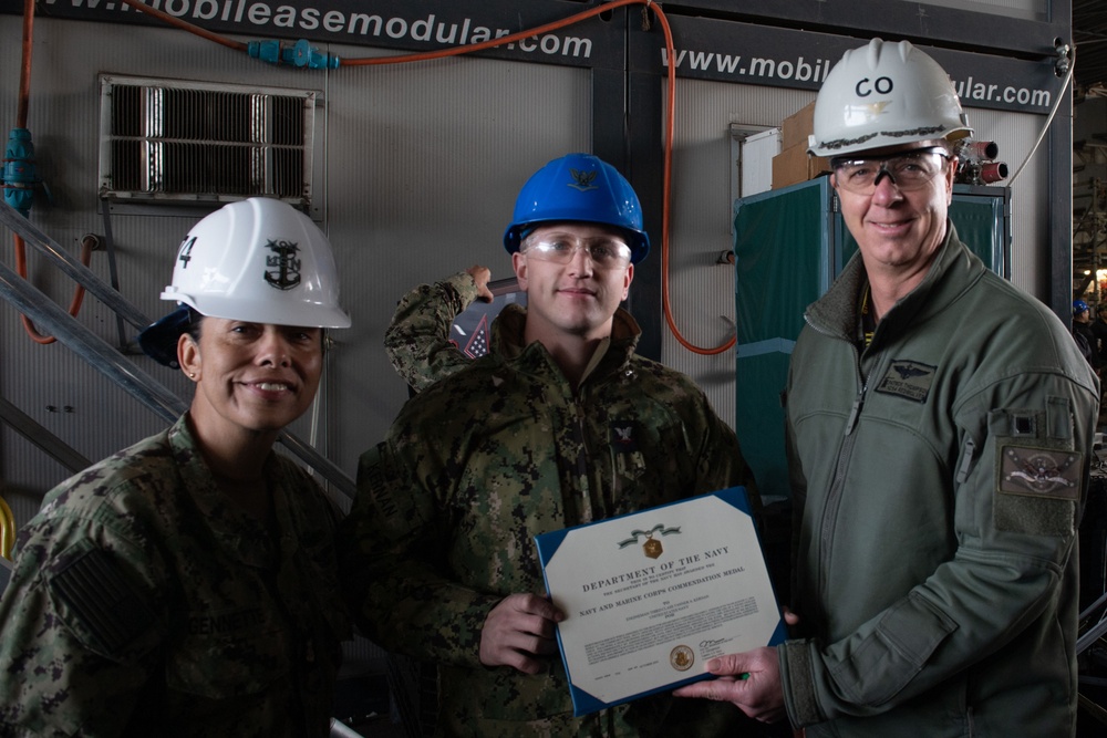 Engineman 2nd Class Tanner Kernan receives Navy and Marine Corps Commendation Medal