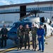 Members of the 58th Special Operations Wing pose in front of a HH-60G Pave Hawk helicopter