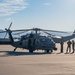 Members of the 58th Special Operations Wing prepare a HH-60G Pave Hawk helicopter for its final flight before retirement