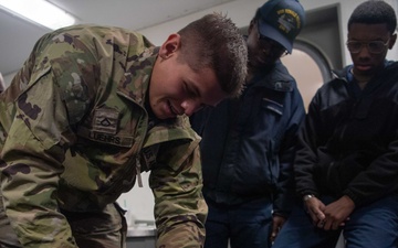 U.S. Army Soldiers assist with TCCC Training Aboard USS Ronald Reagan (CVN76)