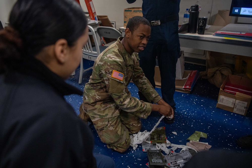 U.S. Army Soldiers assist with TCCC Training Aboard USS Ronald Reagan (CVN76)