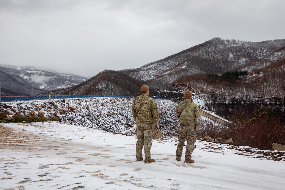 KFOR Soldiers conduct security patrols, maintaining a safe and secure environment