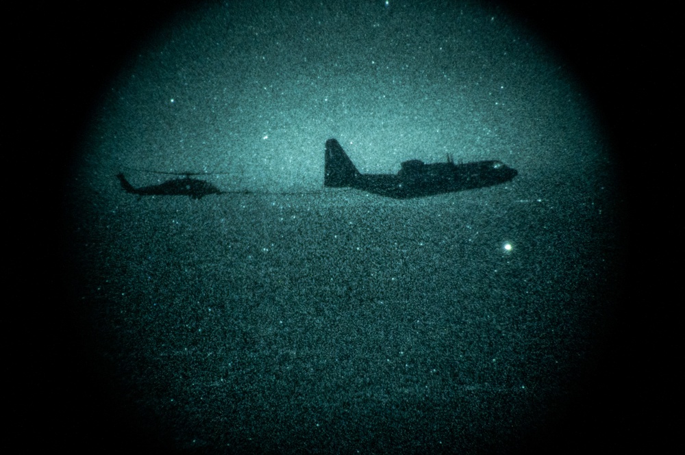 301st Expeditionary Rescue Squadron conducts nighttime air refueling