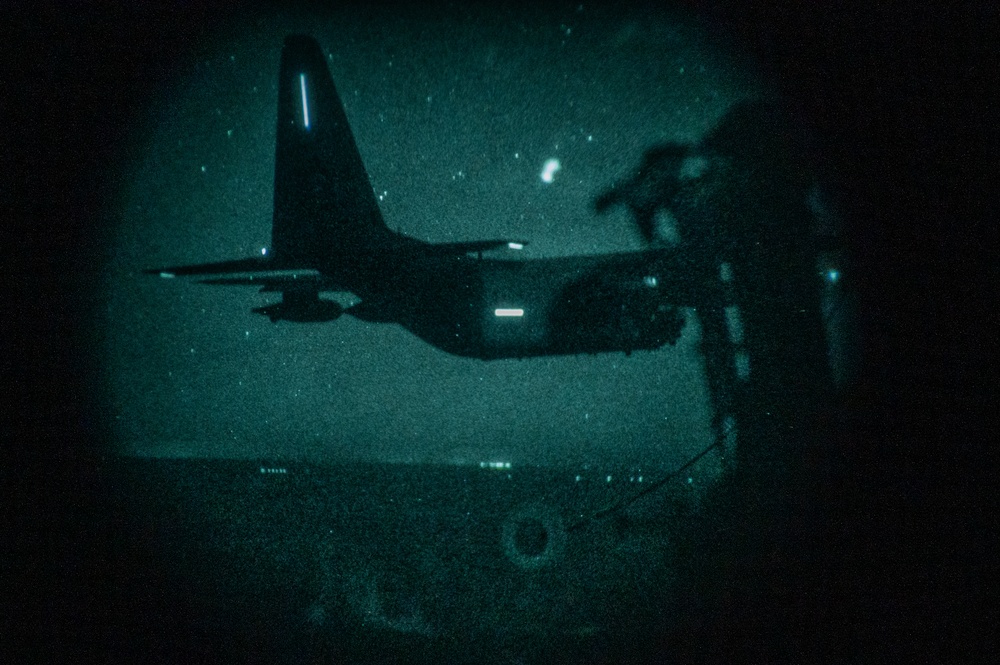 301st Expeditionary Rescue Squadron conducts nighttime air refueling