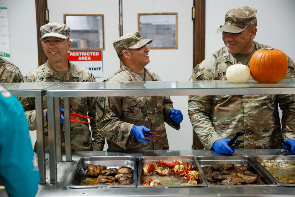 17th Sustainment Brigade command team serve Thanksgiving dinner to Soldiers