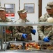 17th Sustainment Brigade command team serve Thanksgiving dinner to Soldiers