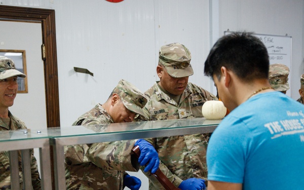 17th Sustainment Brigade command team serve Thanksgiving dinner to Soldiers
