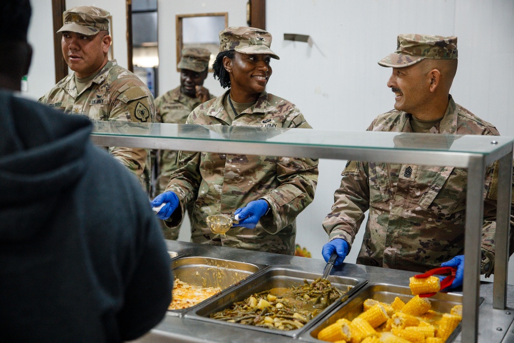 17th Sustainment Brigade command team serve Thanksgiving dinner to Soldiers