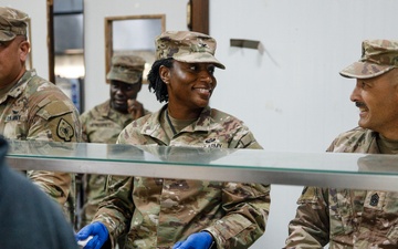 17th Sustainment Brigade command team serve Thanksgiving dinner to Soldiers