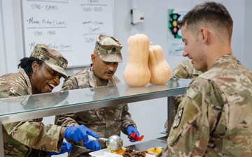 17th Sustainment Brigade command team serve Thanksgiving dinner to Soldiers